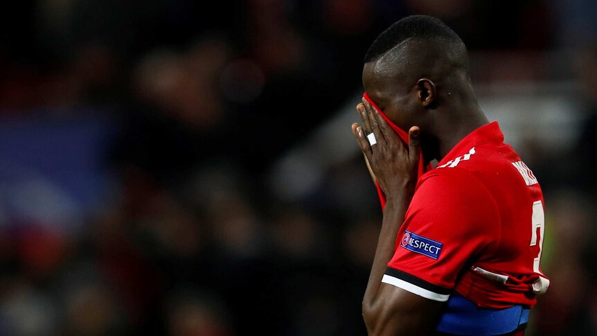 Manchester United's Eric Bailly looks dejected after the match against Sevilla.
