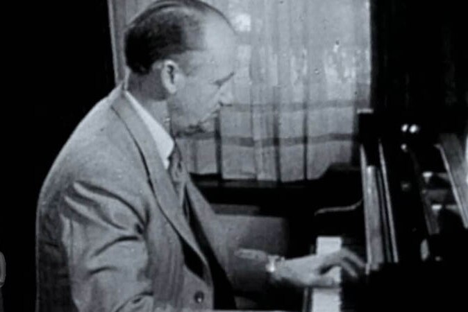 Don Bradman playing piano