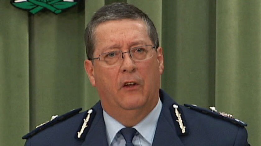TV still of  Ian Stewart, Deputy Commissioner of the Queensland Police Service,