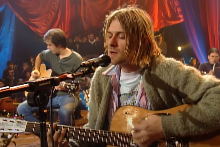 Kurt Cobain's MTV Unplugged guitar sells to Australian for record $9m - ABC  News