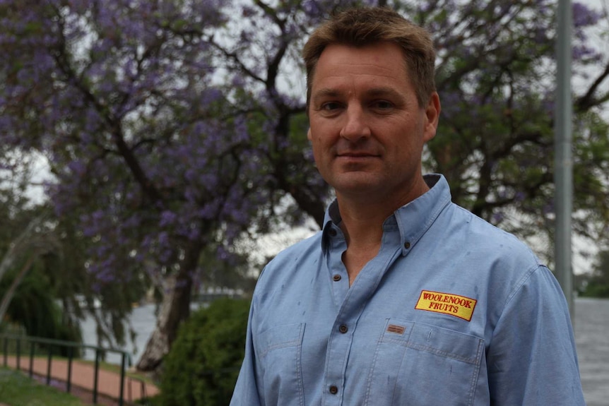 Ben Haslett standing by the river at Renmark in South Australia's Riverland.