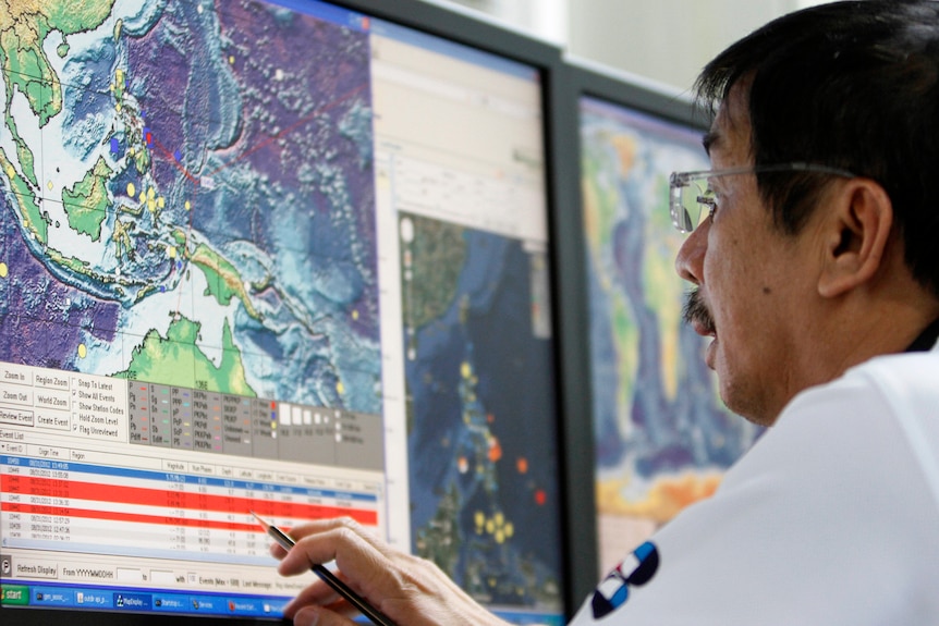 Specialist monitors data after 7.6-magnitude tremor