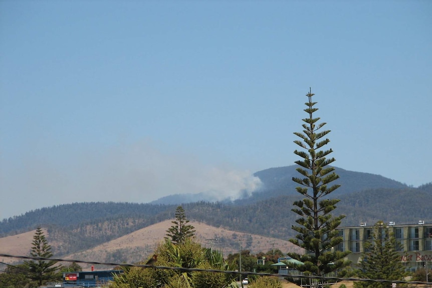 The bushfire is burning in the hills above Four Mile Creek