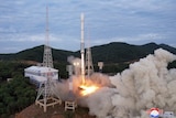 The launch of the newly developed Chollima-1 rocket carrying the Malligyong-1 satellite at the Sohae Satellite Launching Ground.