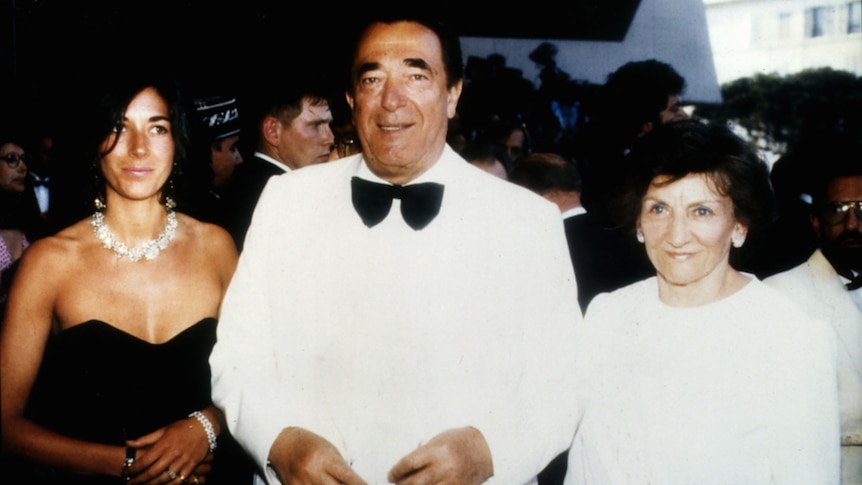 Ghislaine Maxwell in a black strapless ballgown and diamond necklace with Robert Maxwell in a white tux and Elisabeth Maxwell