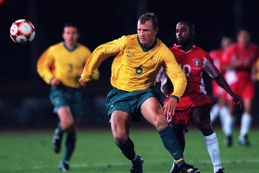 Football player Stephen Laybutt playing with the Socceroos