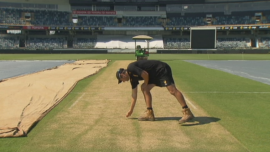 WACA curator Matthew Page inspects the pitch