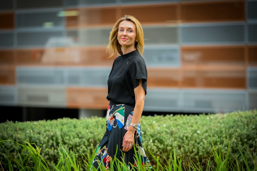 Jennifer stands out the front of Sydney's Royal North Shore Hospital.