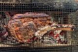 A cut of beef on a grill