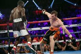 Boxer Jeff Horn stumbles after punch from Terence Crawford