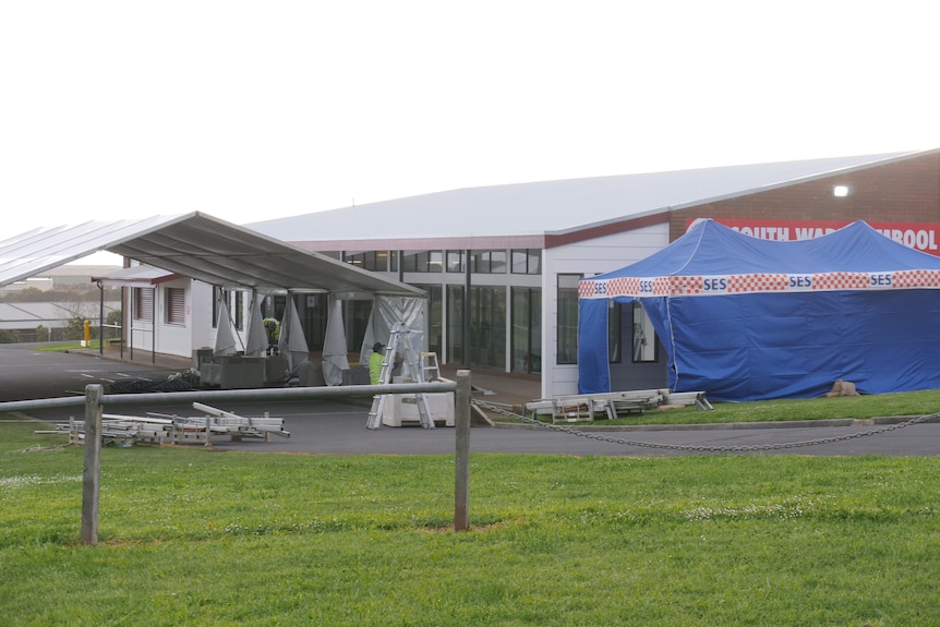 temporary marquees being erected at a public sporting venue