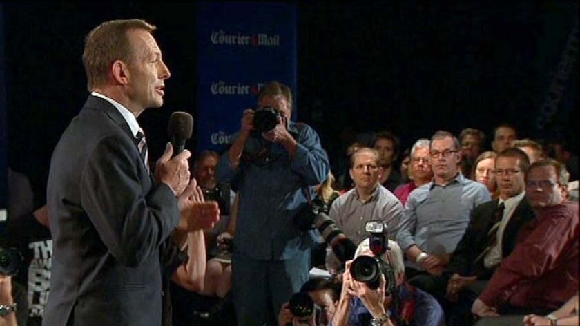 Tony Abbott addresses the crowed at the people's forum at the Broncos Leagues Club