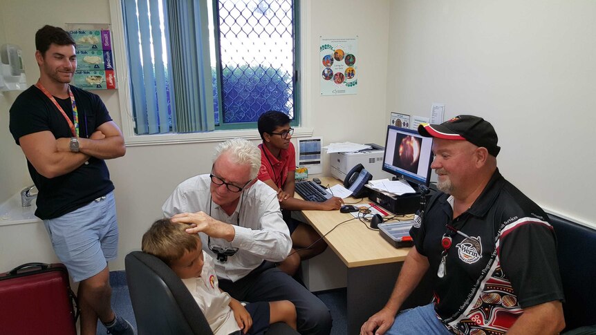 ENT surgeon, Dr John Curotta, examines a patient as part of the new ENT outreach service for Aboriginal children