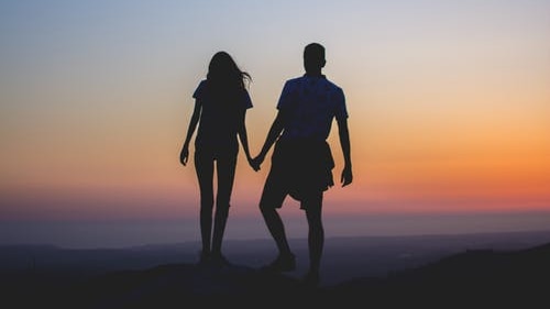 A man and woman on silhouette.