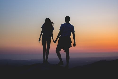A man and woman on silhouette.
