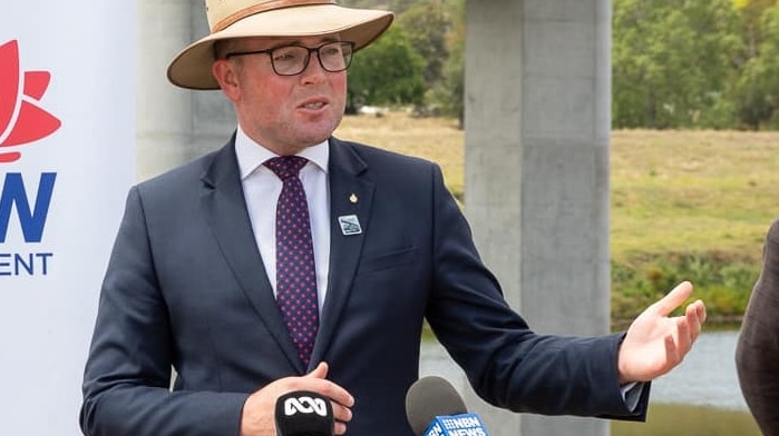 A photo of NSW Agriculture Minister Adam Marshall speaking to media.