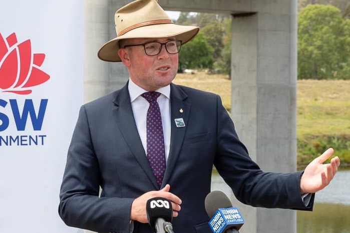 A photo of NSW Agriculture Minister Adam Marshall speaking to media.