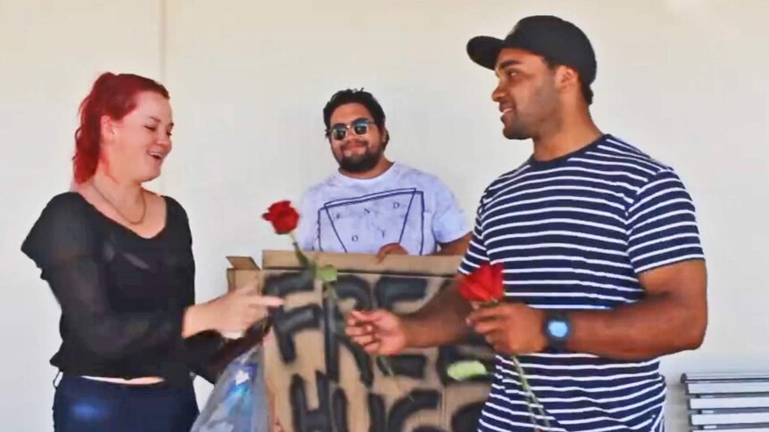 On Valentine's Day, Ignite Bowen's Joshua Batalibasi (pictured right) and Karmon Power gave out free roses to women in Bowen.