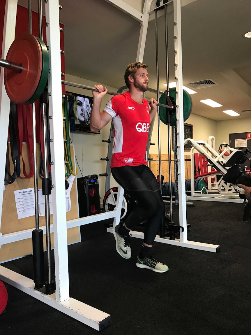 Alex Johnson trains in the gym at the Sydney Swans in 2017.