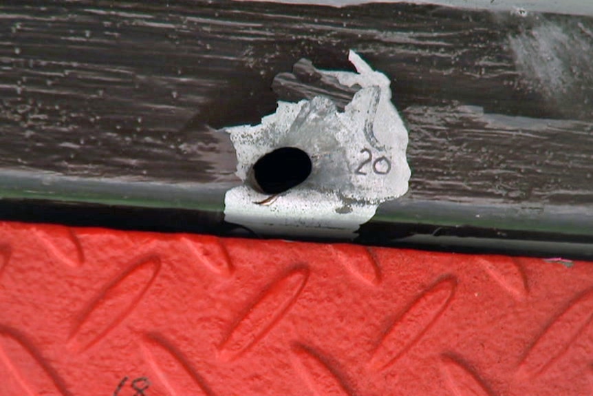 Bullet hole in door