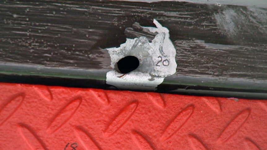Bullet hole in door