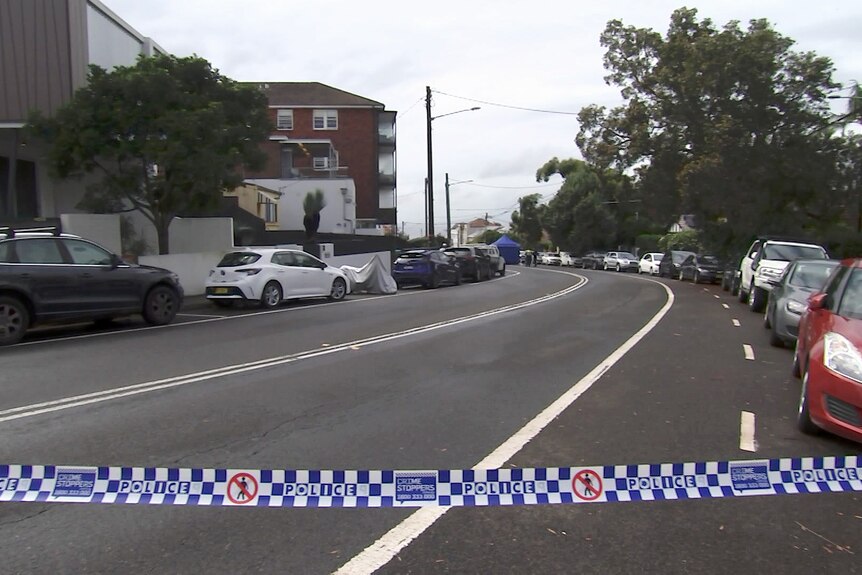 A street cordoned off with police tape where an alleged hit and run took place.