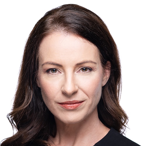 Profile of a woman with shoulder-length brown hair