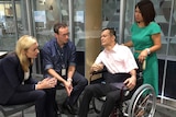 Medical specialists at Brisbane's Mater Hospital speak to Gerhard and Leah Infante.