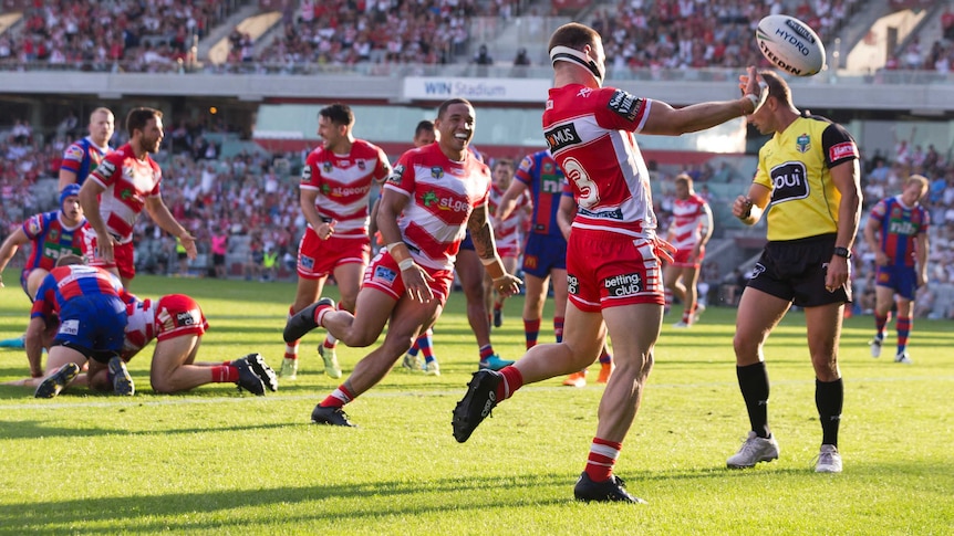 Euan Aitken of the Dragons scores against Newcastle in Wollongong on April 1, 2018.