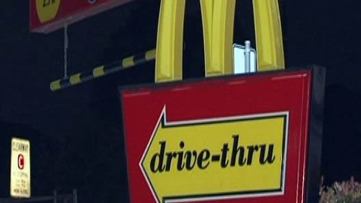 A drive-through sign at the McDonald's restaurant on Woodville Road at Merrylands.