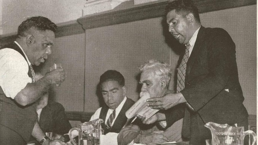 William Cooper and others reading the resolution of the Aborigines Progressive Party Association on 26 January 1938.