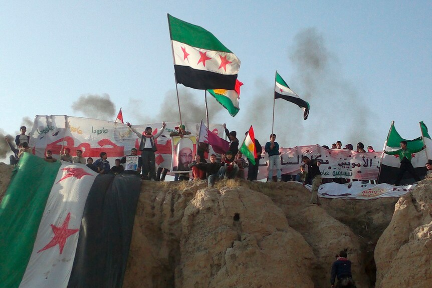 Syria protesters rally against the regime