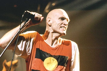 Peter Garrett wears an Indigenous flag shirt