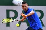 Australia's Nick Kyrgios hits a forehand against Igor Sijsling at the French Open.