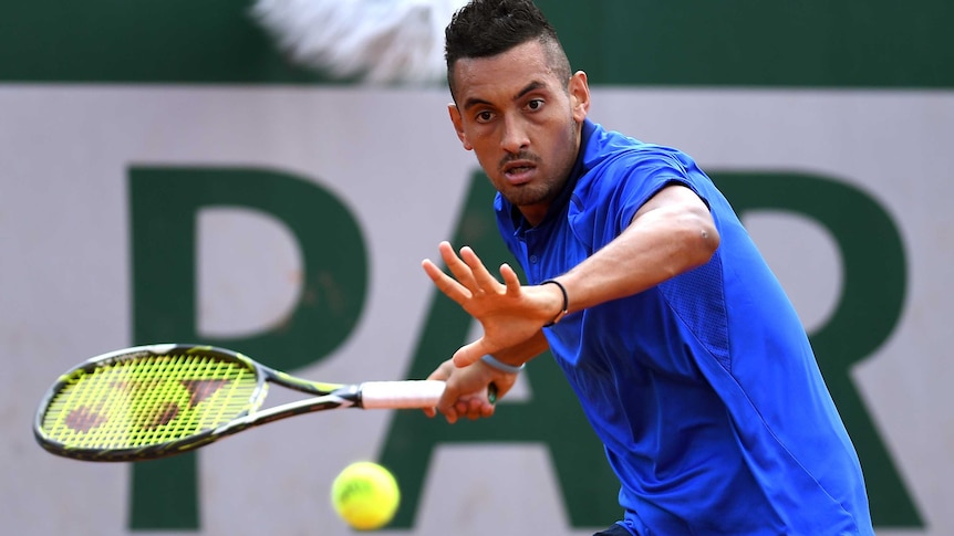 Australia's Nick Kyrgios hits a forehand against Igor Sijsling at the French Open.