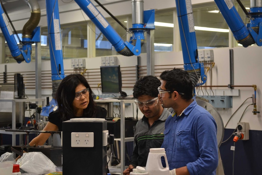 Veena Sahajwalla and colleagues in a lab