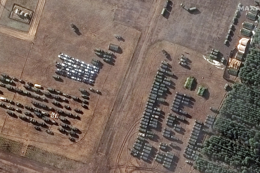A satellite image shows a close up of assembled vehicles at V D Bolshoy Bokov airfield, near Mazyr