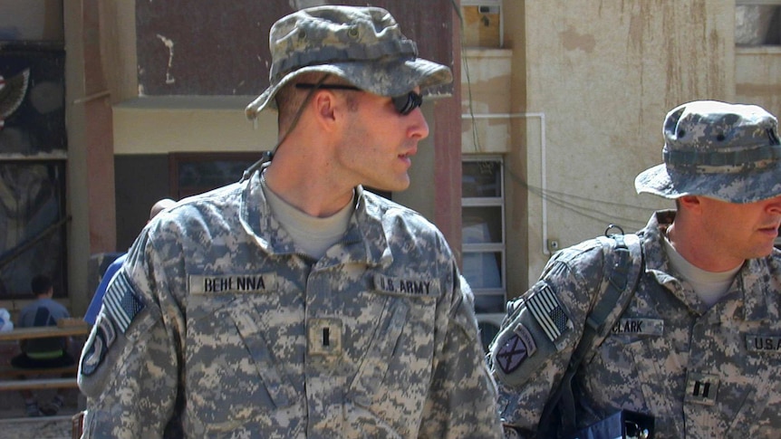 Michael Behenna (left) and his defence attorney Captain Tom Clark (right) walk in Camp Speicher in 2008.