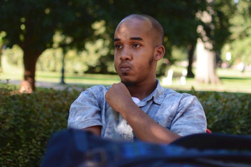 Mid close up of Ohio State attacker, Abdul Razak Ali Artan with trees in background.