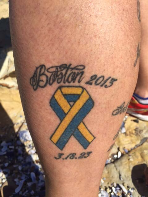 Shane Mundy got a Boston Marathon tattoo on his leg when he returned from the 2013 race in which he ran a personal best.