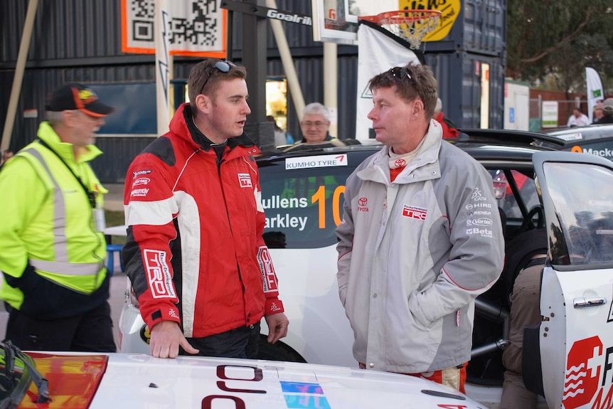 Canberra-based rally driver Neal Bates (right) and son Harry (left) prepare to race in Canberra.