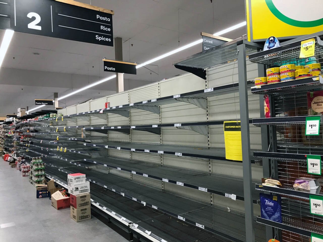 Online sales halted, supermarket shelves stripped bare as shoppers