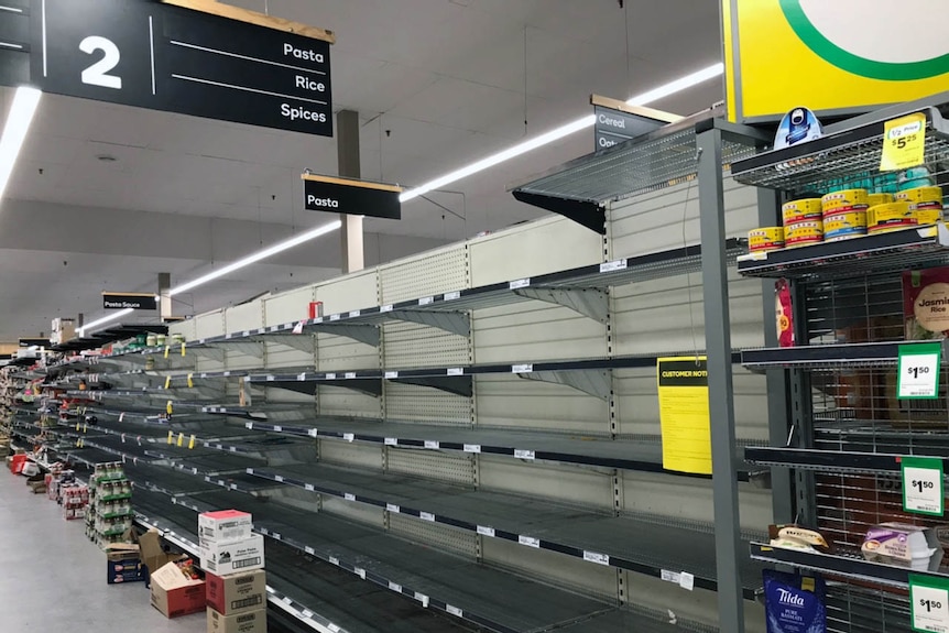 Empty supermarket shelves at Woolworths.