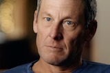 Lance Armstrong looks straight at the camera