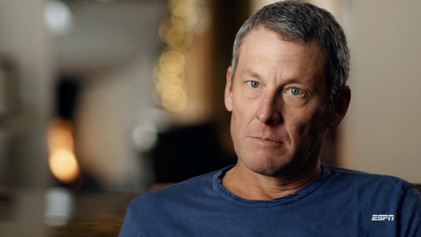 Lance Armstrong looks straight at the camera