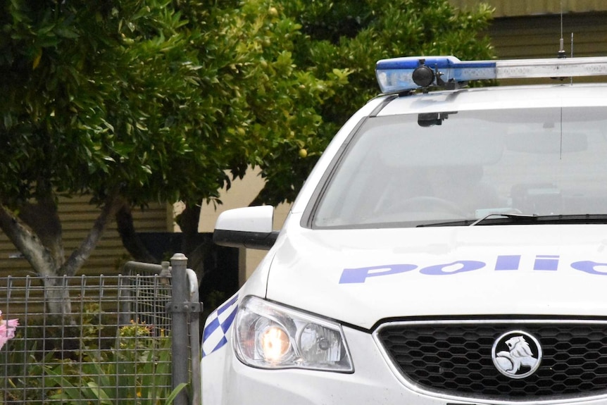 A police car at the home of Michael Cardomone on Sunday, January 17.