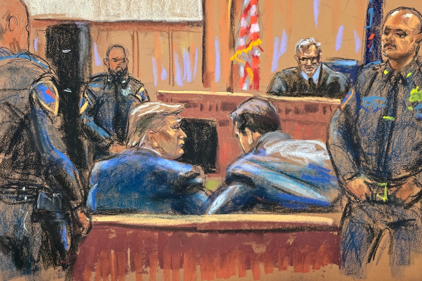 A sketch shows Donald Trump seated in a courtroom. A man in a suit sits next to him. Guards stand around the court.