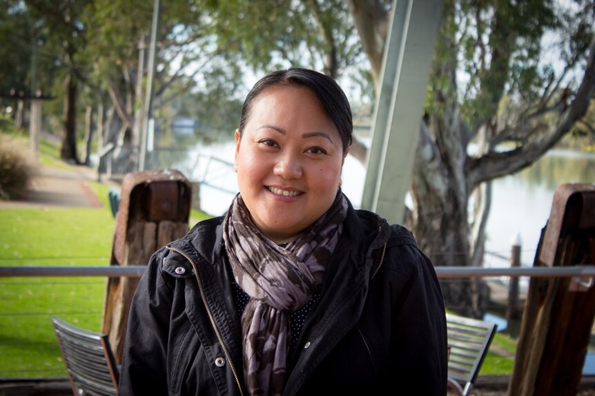 Michelle Huynh standing near the River Murray