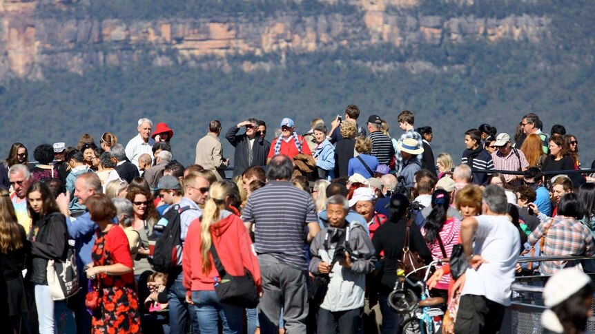 People gather at Katoomba to wait for the arrival of the Duke and Duchess of Cambridge.
