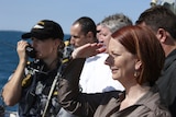 Prime Minister Julia Gillard is given a tour of HMAS Coonawarra
